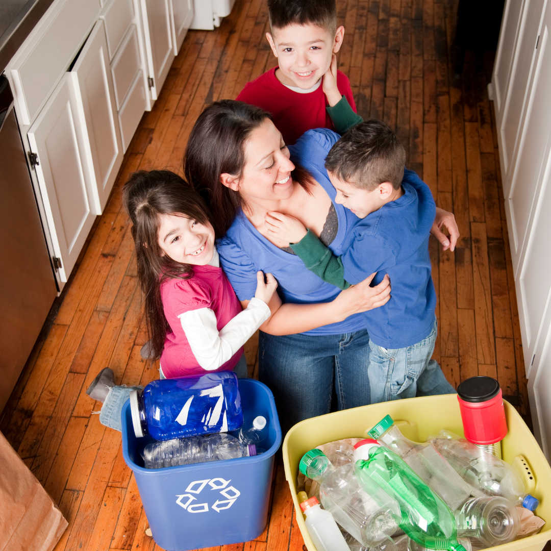 family recycling together